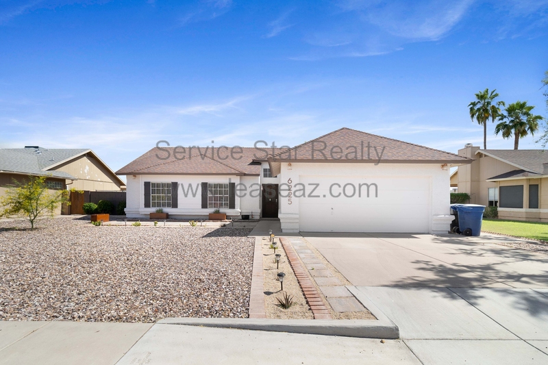 Chandler House: 6225 W Del Rio St