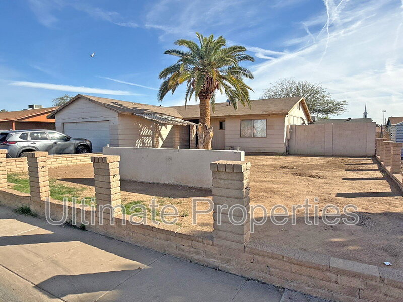 Tolleson House: 707 N 95th Dr