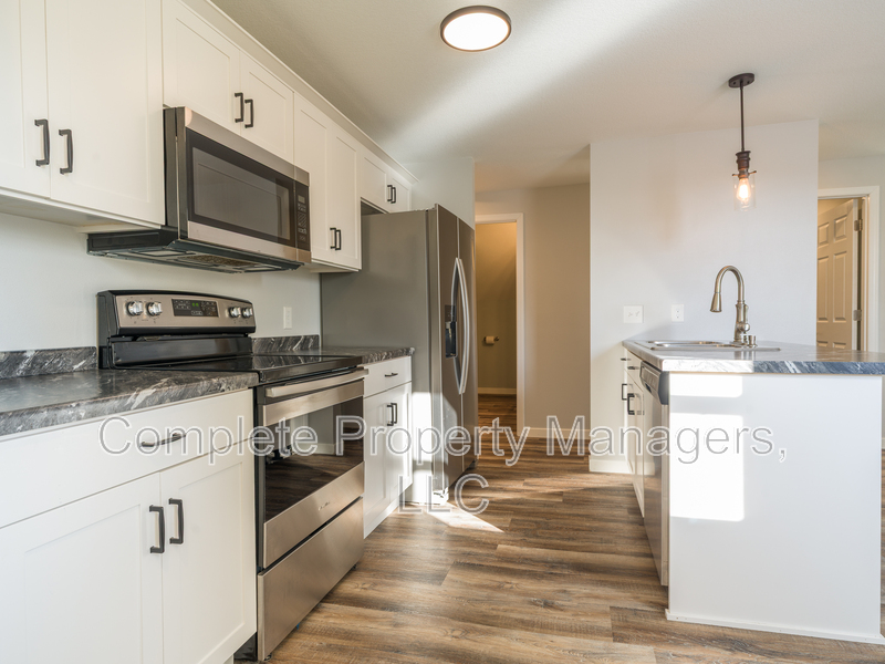 Clarks Grove Condo: 103 Main Street East - 2
