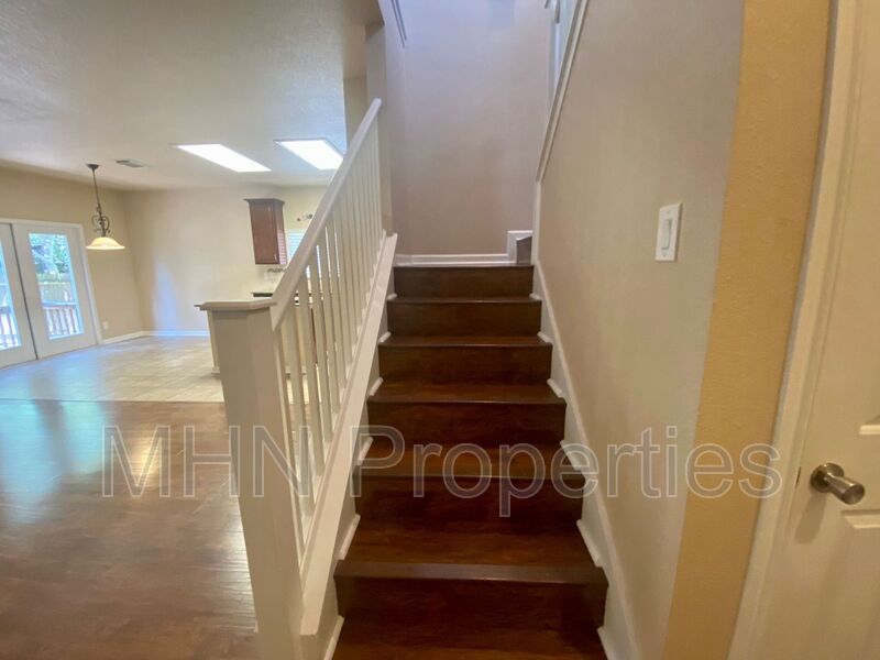FABULOUS 4 bed/2.5 bath home in Champion Springs with Wood Floors/Granite Countertops and more! - Photo 10