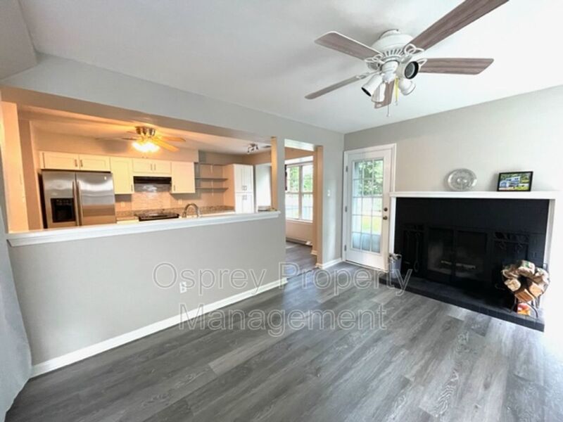 Experience the epitome of peaceful living in this remarkable two-story home! - Photo 5