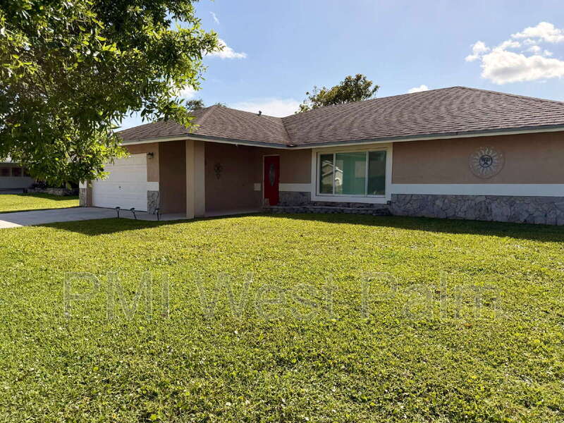 Royal Palm Beach House: 147 Sunflower Cir