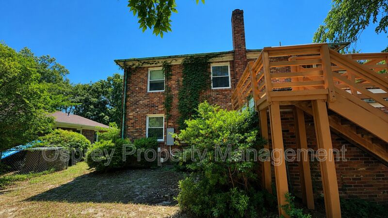 Charming 2BR with Sunroom, Hardwood Floors & Lawn Care Included - Photo 19