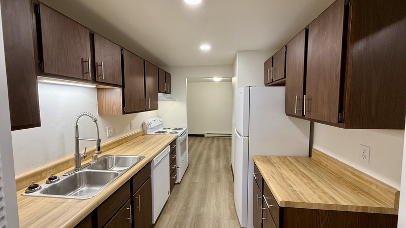 Two Rivers Condo: 1818 School Street - a