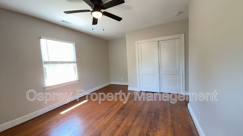Charming 2BR with Sunroom, Hardwood Floors & Lawn Care Included - Photo 15
