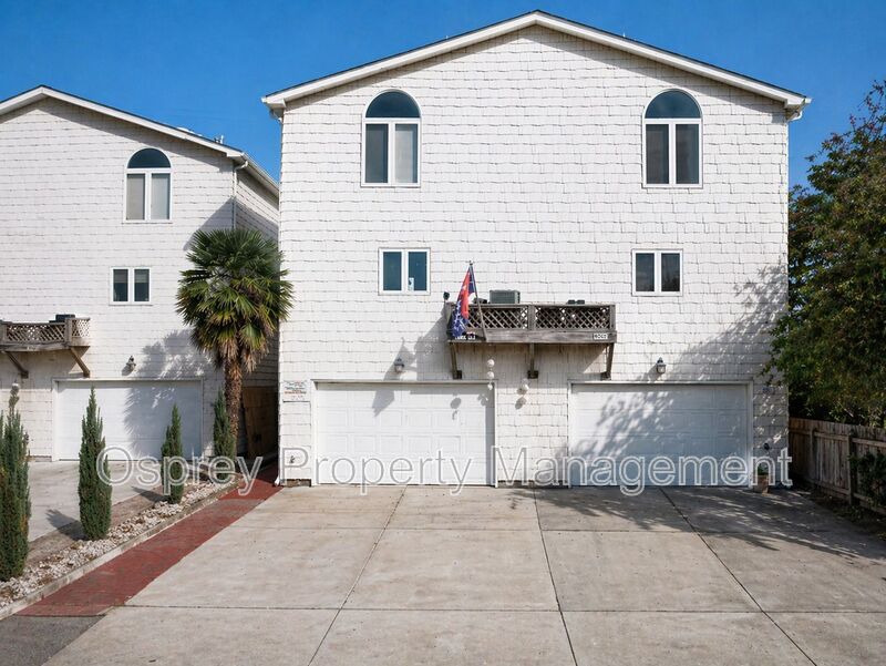 Luxury 3-Story Home Near Chic’s Beach with Water Views & Private Decks - Photo 1