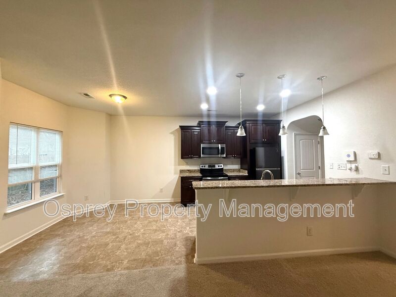 Spacious 4BR Home with Large Fenced Yard & Prime Location  - Photo 4