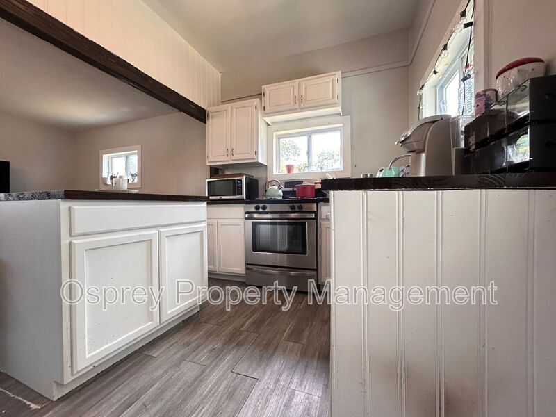 Charming 2BR/1BA Home with Garage & Fenced Yard - 