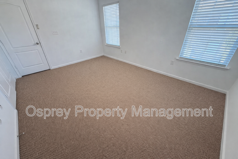 Spacious End-Unit Condo with Dual Primary Suites & Bonus Room  - Photo 9