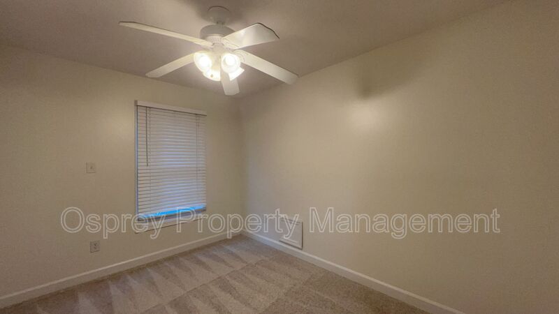 Spacious 4-Bedroom Home with Sunroom! - Photo 13