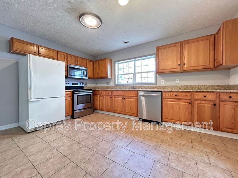 Spacious 4-Bedroom Home W/Sunroom & Large Backyard
