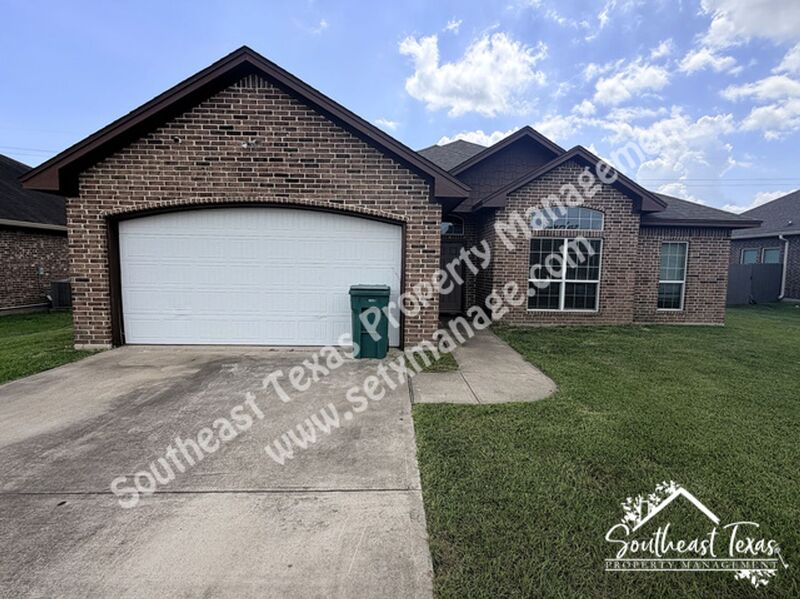 Orange House: 1102 Cypresswood Drive