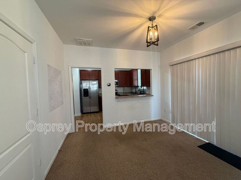 Spacious End-Unit Condo with Dual Primary Suites & Bonus Room  - Photo 5