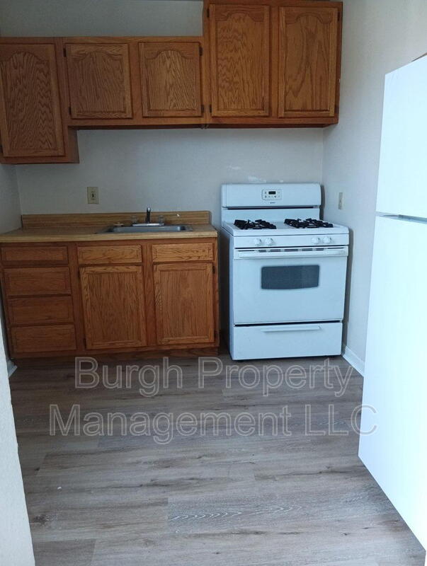 Homestead Condo: 116 W 8th Ave