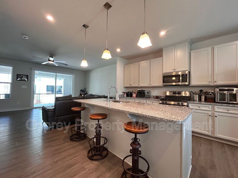 Spacious 4-Bedroom Townhome with Garage & Prime Suffolk Location!