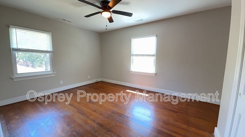 Charming 2BR with Sunroom, Hardwood Floors & Lawn Care Included - Photo 17