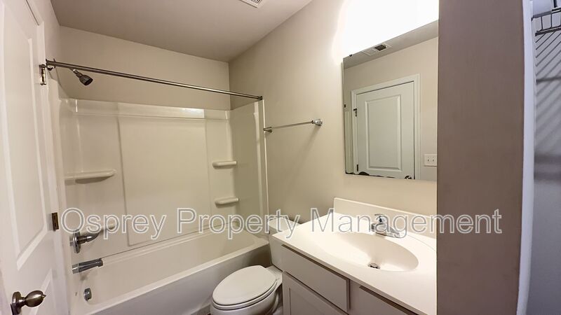 Charming 3-Bedroom Suffolk Home with Garage & Deck - Photo 9