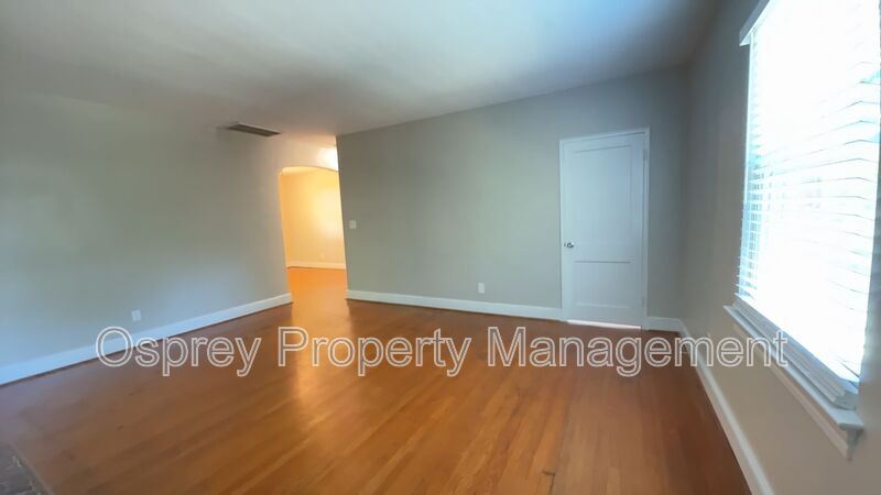 Charming 2BR with Sunroom, Hardwood Floors & Lawn Care Included - Photo 12