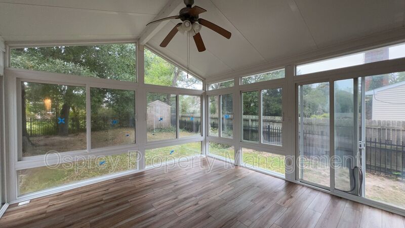 Spacious 4-Bedroom Home with Sunroom! - Photo 32