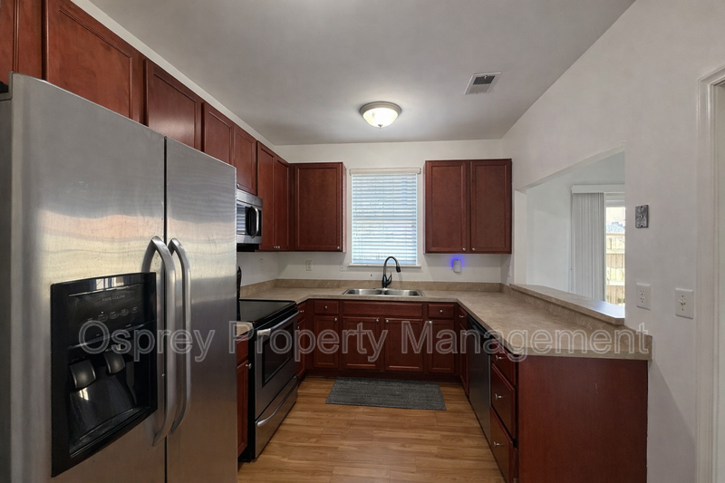 Spacious End-Unit Condo with Dual Primary Suites & Bonus Room  - Photo 4