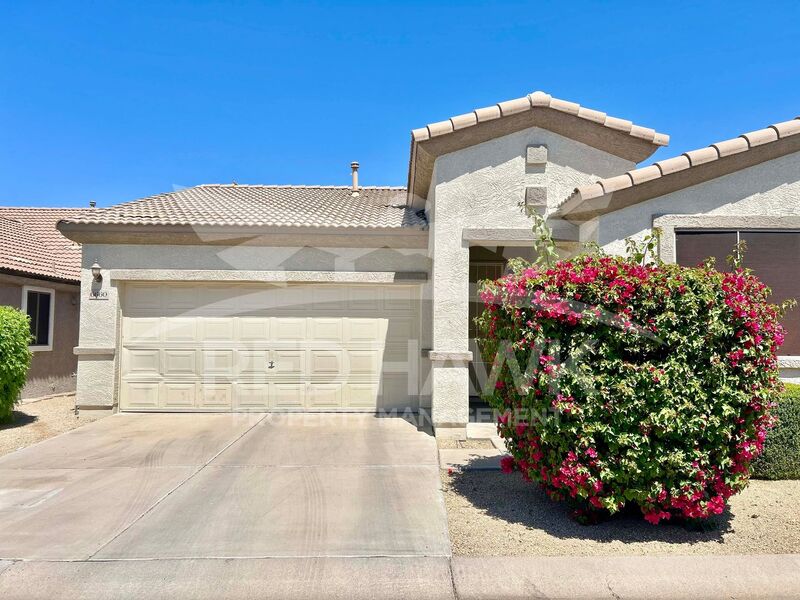 Mesa House: 6660 E. Roland St.