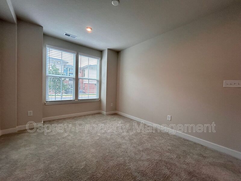 Spacious 4-Bedroom Townhome with Garage & Prime Suffolk Location!