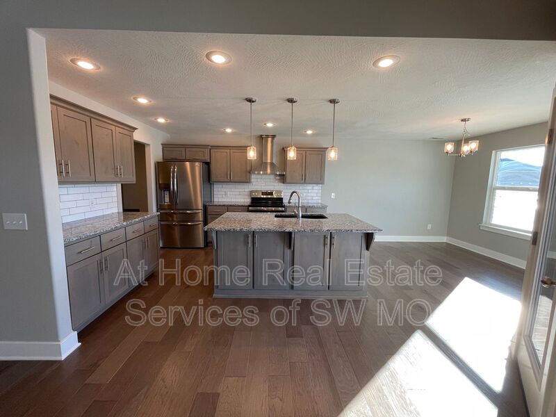 Battlefield House: 5943 S Iris Lane