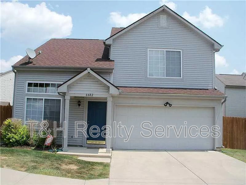 Plainfield House: 6682 Dunsdin Drive