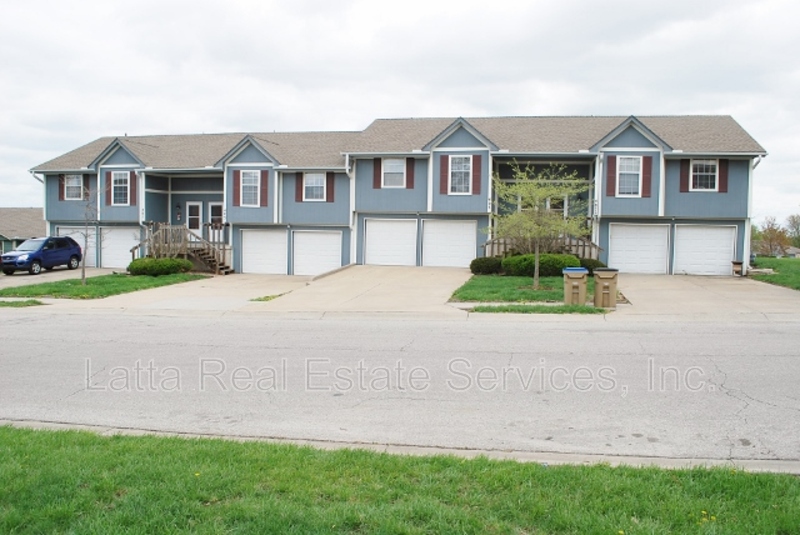 Raymore Condo: 401 S Sunrise Dr