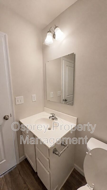 Charming 3-Bedroom Suffolk Home with Garage & Deck - Photo 13