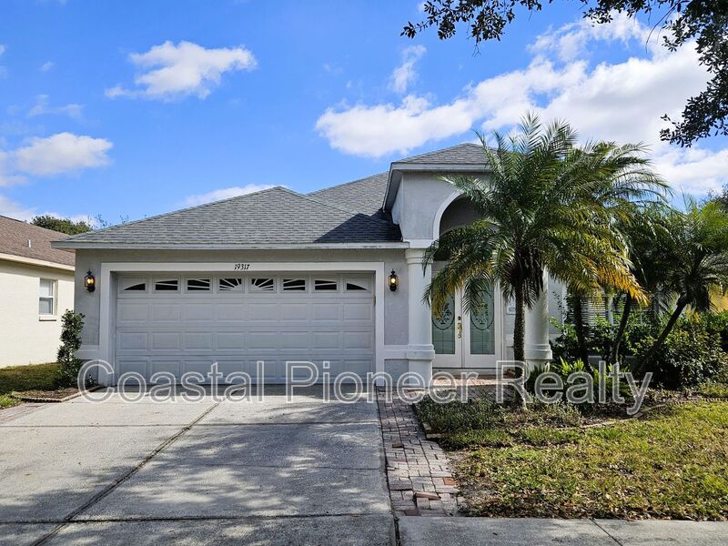 Lutz House: 19317 Seacove Dr.