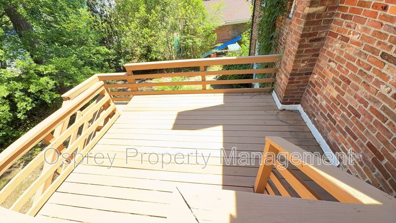 Charming 2BR with Sunroom, Hardwood Floors & Lawn Care Included - Photo 21