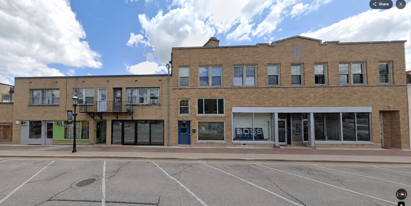 West Bend House: 143 North 6th Ave. - Comm