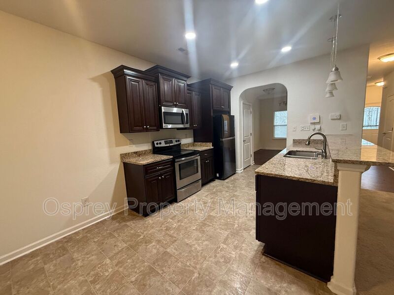 Spacious 4BR Home with Large Fenced Yard & Prime Location  - Photo 3