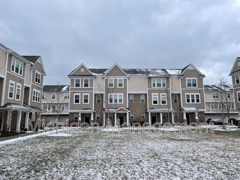Wixom Condo: 411 Wright St