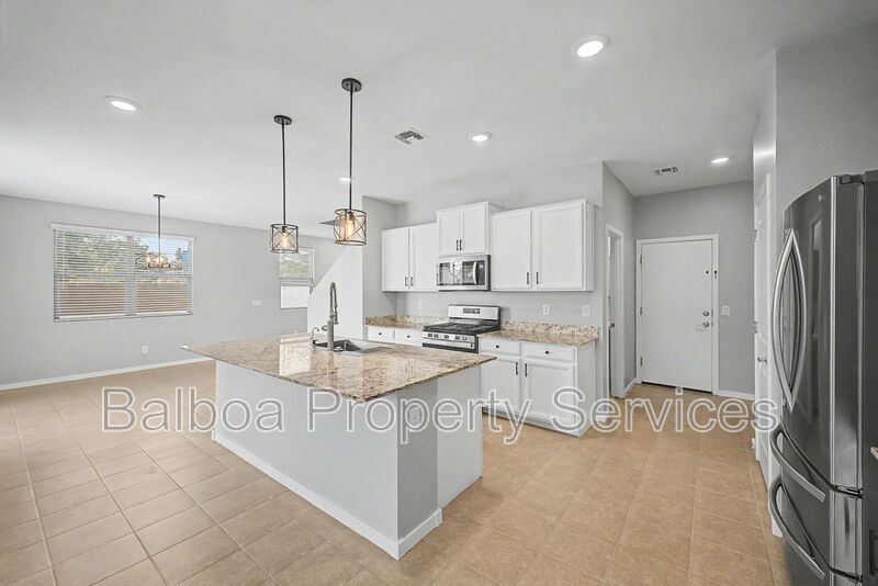 Surprise House: 14231 W Voltaire St