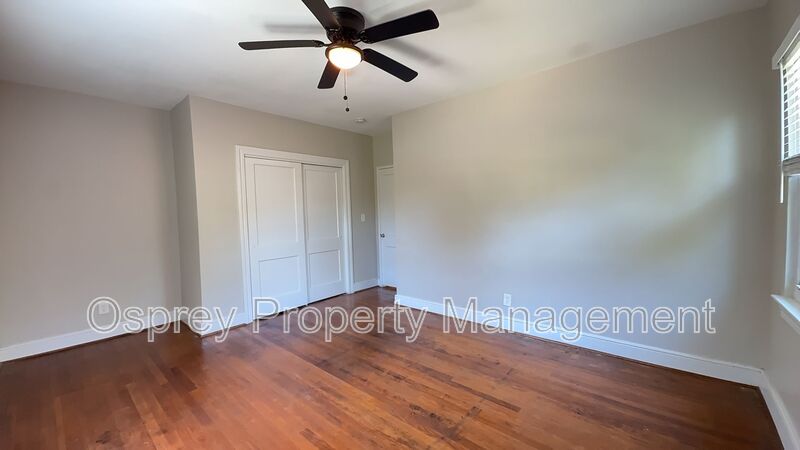 Charming 2BR with Sunroom, Hardwood Floors & Lawn Care Included - Photo 16