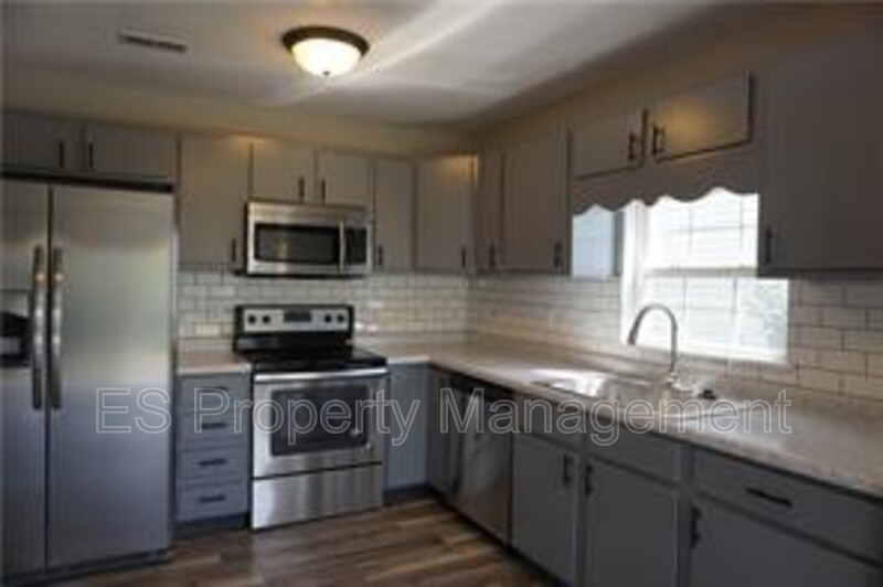 Stunning 3 Bedroom 2 Bathroom Brick Front Ranch Home in Warren! - Photo 41