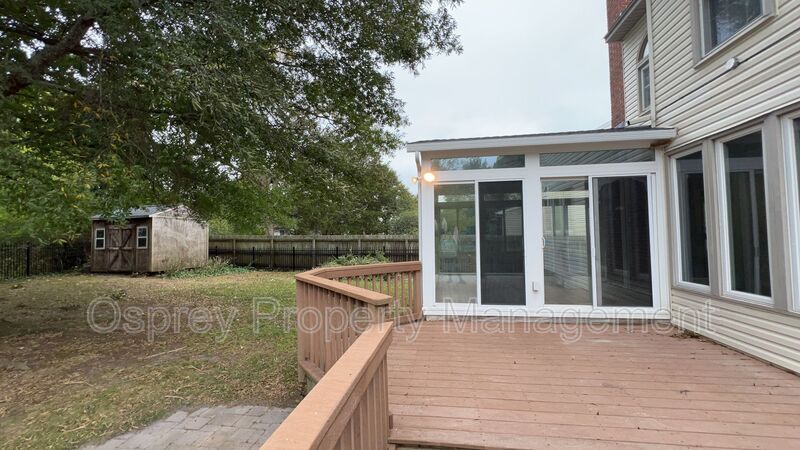 Spacious 4-Bedroom Home with Sunroom! - Photo 29