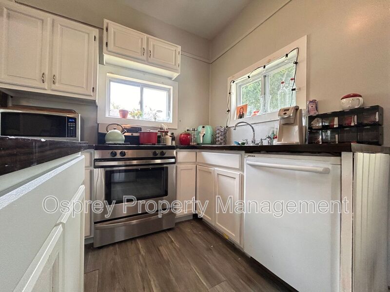 Charming 2BR/1BA Home with Garage & Fenced Yard - 