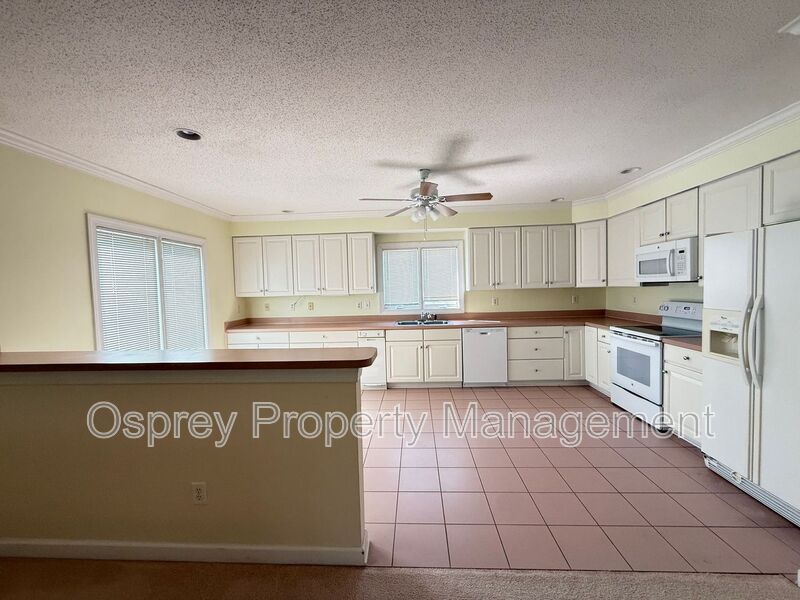 Luxury 3-Story Home Near Chic’s Beach with Water Views & Private Decks - Photo 3