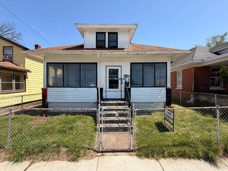 Michigan City House: 215 N Woodland Ave