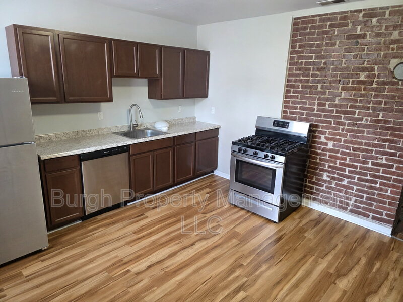 Homestead Condo: 114 W 8th Ave