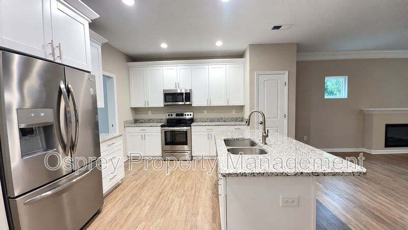 Spacious 4-Bedroom Norfolk Home with 2-Car Garage & Flexible Bonus Space - Photo 3