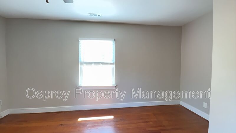 Charming 2BR with Sunroom, Hardwood Floors & Lawn Care Included - Photo 14