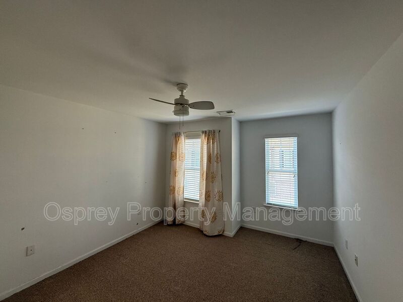 Spacious End-Unit Condo with Dual Primary Suites & Bonus Room  - Photo 12