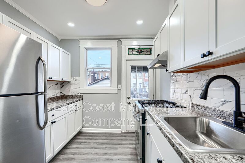 Baltimore House: 3028 Kenyon Ave