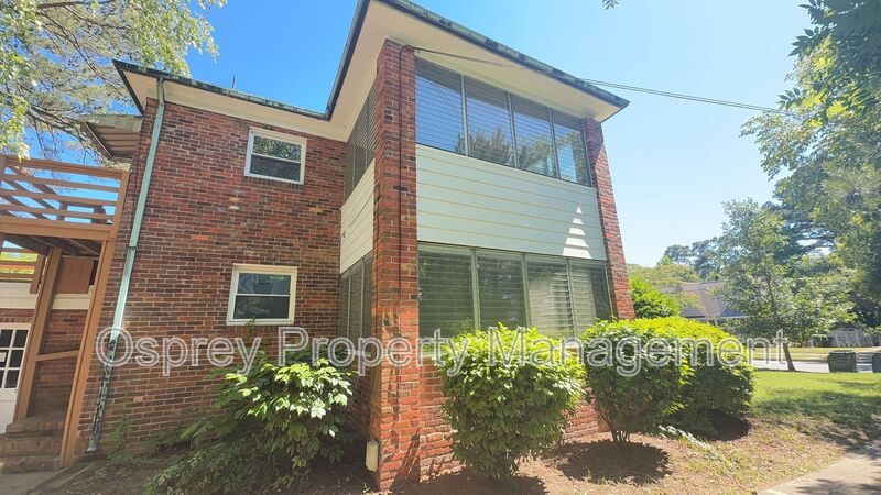 Charming 2BR with Sunroom, Hardwood Floors & Lawn Care Included - Photo 18
