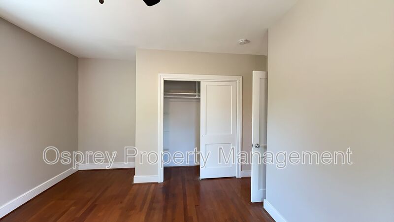 Charming 2BR with Sunroom, Hardwood Floors & Lawn Care Included - Photo 13