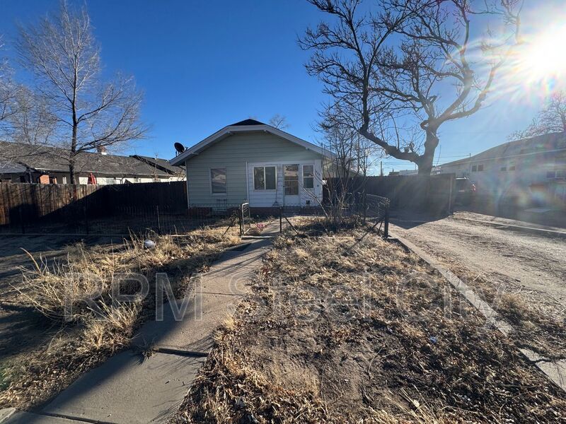 Pueblo House: 1506 E 14th St